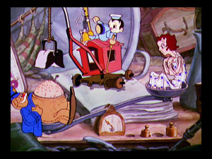 The sailor toy helps remove excess sawdust from one toy to help fill another