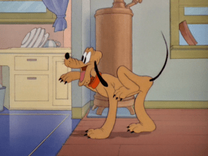 Pluto traipses about happily in the house, thinking about how he can get the roast that the cook just made