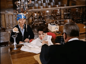 Merlin and Jennifer are presented in front of the judge, where they try to explain the experiment they were conducting