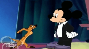 Mickey uses reverse psychology on Timon to make him go out on stage with Pumbaa