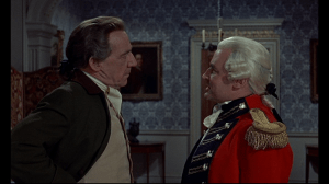 General Pugh (R) and Squire Banks do not see eye to eye, particularly with Pugh's suggested violent methods