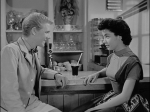 Annette makes a friend in Mike, who works at the malt shop