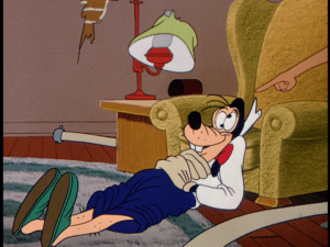 The iron Goofy left on falls through the ceiling, landing square on his head