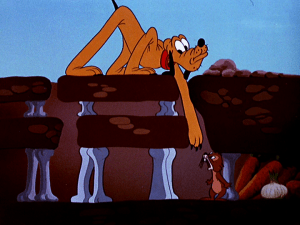 Pluto reaches in to find the gopher, not realizing that all the bones he's buried have been used for the gopher's home