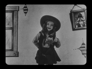 Sheriff Alice surveys the cartoon saloon