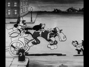 Mickey arrives triumphantly on the scene to put out the fire