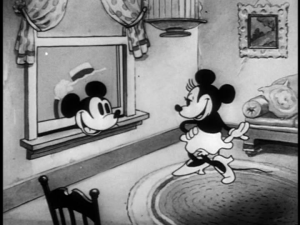 Minnie greets Mickey as he is trapped in her window
