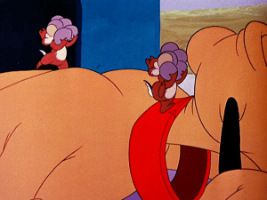 Chip and Dale are unaware Pluto has returned, even as they walk across him to get their acorns back to their tree