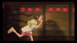 Chihiro runs through the bathhouse, looking for her parents, unable to believe they have been turned into pigs