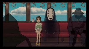 Chihiro and her friends sit on the long journey to Zeniba's