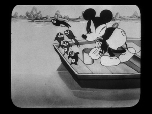 Mickey chases the fish from his boat, but they have already eaten most of his bait