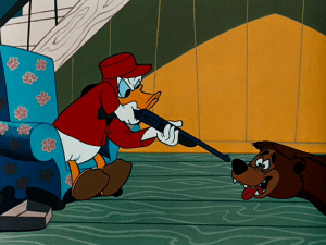 Donald pretends to shoot his bearskin rug, making his "rug" rather nervous