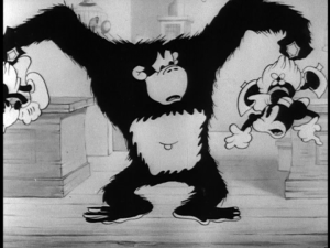 Beppo pries Minnie away from Mickey, acting as though he were King Kong
