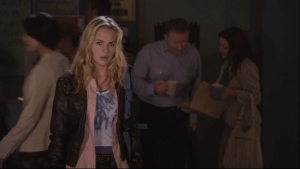 On Allie's first day of school, she sees a bully being stopped by the quarterback