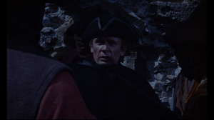 Fragg is ambushed by the Scarecrow's men while waiting for Ransley