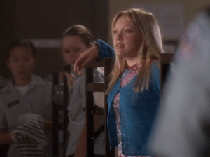 Kelly arrives at the barracks, amid stares from the other cadets