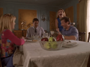 Kelly enjoys family dinner with Joe, her mother, and her father