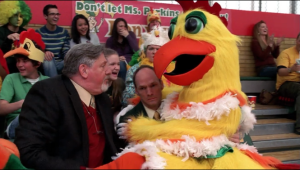 Pete does a variety of stunts as the mascot, much to the delight of the audience and dismay of Coach Mackey.