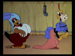 The Two Claras walk daintily on to the stage when announced by Mickey 