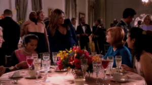 At the promotion ceremony, Claudia Joy protects her husband by confronting Lenore Baker, the woman who spread rumors about Michael