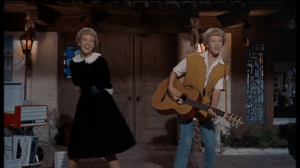 The girls recreate their parents' first date and entertain them with a floor show