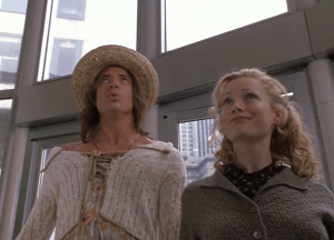 Ursula takes George into the city to get some clothes and adjust to the new jungle