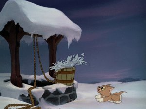 The kitten's ball bounces into the well bucket, leading the kitten to certain danger