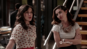 Birdie takes a rather stunned Jane around the office