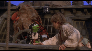 Jim hurries to tell Smollett of the danger after overhearing Long John's plans