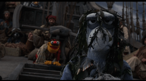 Jim and friends dress up Mr. Arrow as a ghost to scare the pirates